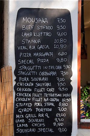 Typical Greek menu, Skiathos Town, Skiathos, Sporades Islands, Greek Islands, Greece, Europe Stock Photo - Rights-Managed, Code: 841-02991172
