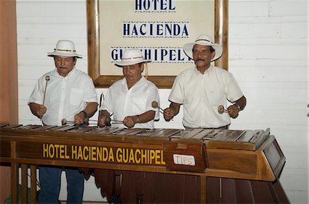 simsearch:841-02992603,k - Musicians playing a type of xylophone, Hacienda Guachipelin, near Rincon de la Vieja National Park, Guanacaste, Costa Rica, Central America Foto de stock - Con derechos protegidos, Código: 841-02992556