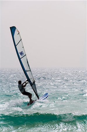 Wind surfing at Santa Maria on the island of Sal (Salt), Cape Verde Islands, Africa Foto de stock - Con derechos protegidos, Código: 841-02993743