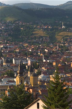 View over city with Orthodox cathedral in foreground, Sarajevo, Bosnia, Bosnia-Herzegovina, Europe Stock Photo - Rights-Managed, Code: 841-03028874