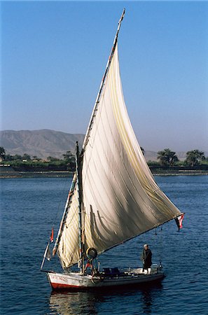 felucca - Felouque sur le fleuve du Nil, en Égypte, en Afrique du Nord, Afrique Photographie de stock - Rights-Managed, Code: 841-03029184