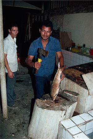 Portrait of man preparing Mazgouf fish, Abu Nawas street market, Baghdad, Iraq, Middle East Stock Photo - Rights-Managed, Code: 841-03029234