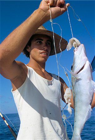 praslin island - Fisherman and his catch, northeast coast, island of Praslin, Seychelles, Indian Ocean, Africa Foto de stock - Direito Controlado, Número: 841-03034077