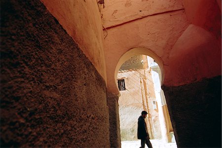 simsearch:841-03031532,k - A man walking past a doorway,Marrakech,Morocco Stock Photo - Rights-Managed, Code: 841-03034657