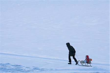 person riding toboggan - Sledge on snowfield,Austria,Europe Stock Photo - Rights-Managed, Code: 841-03035504