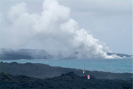 simsearch:841-03030657,k - Steam plumes from hot lava flowing onto the beach and hitting the ocean, Kilauea Volcano, Hawaii Volcanoes National Park, UNESCO World Heritage Site, Island of Hawaii ('Big Island'), Hawaii, United States of America, North America Stock Photo - Rights-Managed, Code: 841-03030673