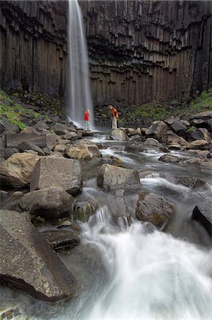 Tourists at Svartifoss waterfall, with basalt columns, Skaftafell National Park, South area, Iceland, Polar Regions Stock Photo - Rights-Managed, Code: 841-03032195