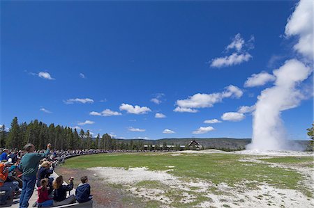 Crowds of spectators watching Old Faithful Geyser erupting, Upper Geyser Basin, Yellowstone National Park, UNESCO World Heritage Site, Wyoming, United States of America, North America Stock Photo - Rights-Managed, Code: 841-03032345