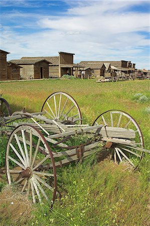 Old western wagons, restored storefronts, homes and saloons from the pioneering days of the Wild West at Cody, Montana, United States of America, North America Stock Photo - Rights-Managed, Code: 841-03032353