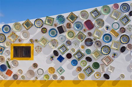 Traditional Portuguese pottery, artisan workshop with plates on wall, Cape St. Vincent peninsula, Sagres, Algarve, Portugal, Europe Stock Photo - Rights-Managed, Code: 841-03032387