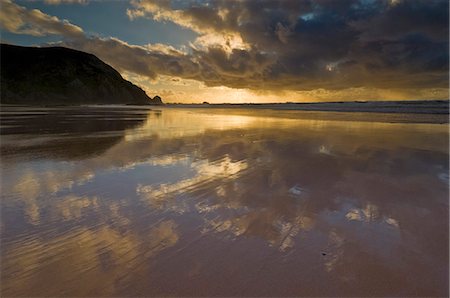 simsearch:841-02720426,k - Sunset reflected in tidal wash, Praia do Castelejo beach near Vila do Bispo, Algarve, Portugal, Europe Stock Photo - Rights-Managed, Code: 841-03032380