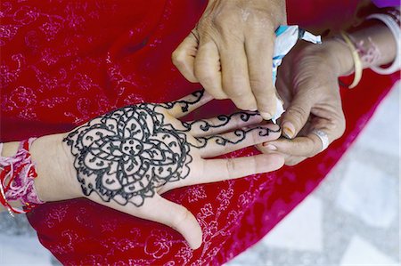 simsearch:841-02945927,k - Henna designs being applied to a woman's hand, Rajasthan state, India, Asia Foto de stock - Con derechos protegidos, Código: 841-03032809