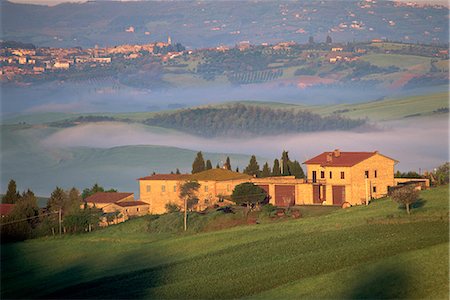 pienza - Houses in a misty landscape near Pienza, Siena Province, Tuscany, Italy, Europe Stock Photo - Rights-Managed, Code: 841-03033212