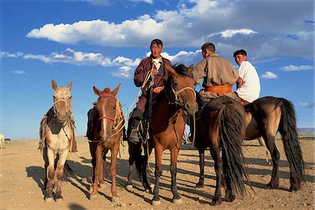 Portrait of nomad men and their horses, Naadam Festival, Altai, Gov-altai, Mongolia, Central Asia, Asia Foto de stock - Con derechos protegidos, Código: 841-03033258