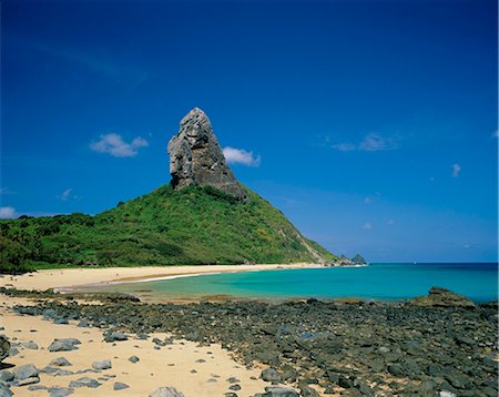 fernando de noronha - View of Praia do Conceicao beach and Morro do Pico in the background, Parque Nacional de Fernando de Norohna, Fernando de Noronha, Pernambuco, Brazil, South America Fotografie stock - Rights-Managed, Codice: 841-03033701