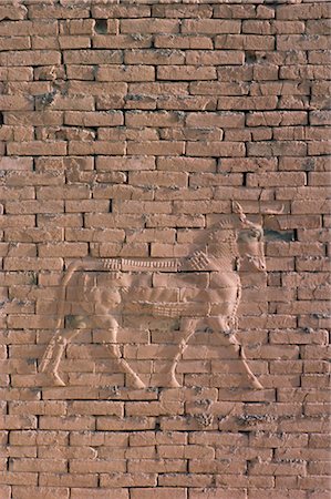 Animal in relief on the wall of the South Palace, archaeological site of Babylon, Iraq, Middle East Stock Photo - Rights-Managed, Code: 841-03033864