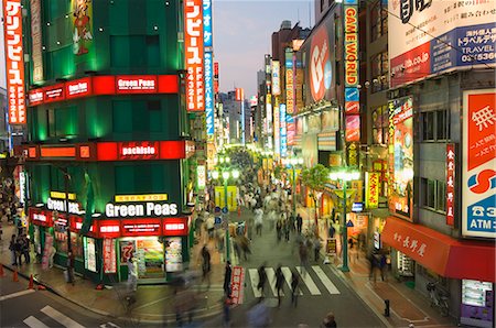 Busy streets and neon signs in the evening at Shinjuku station, Shinjuku, Tokyo, Japan, Asia Stock Photo - Rights-Managed, Code: 841-03054786