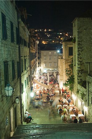 simsearch:841-07354938,k - Cobbled steps and outdoor restaurants leading down to Placa Promenade, Old Town, Dubrovnik, UNESCO World Heritage Site, Dalmatia, Croatia, Europe Stock Photo - Rights-Managed, Code: 841-03054853