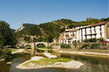 Roman bridge over the River Esca, Burgui Village, Val del Roncal, Navarra, Euskadi, Spain, Europe Stock Photo - Rights-Managed, Code: 841-03054915