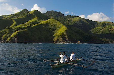 philippine fishing boat pictures - Spectacular coastal scenery and small fishing boat, Camarines Sur, Caramoan National Park, Bicol Province, southeast Luzon, Philippines, Southeast Asia, Asia Stock Photo - Rights-Managed, Code: 841-03055196