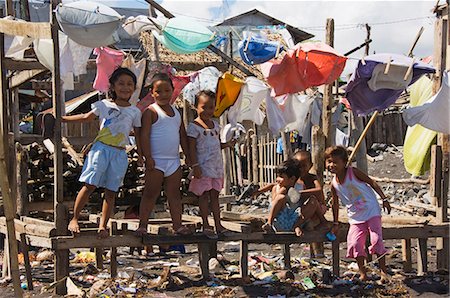 Shanty town on edge of Legaspi City, Bicol Province, Southeast Luzon, Philippines, Southeast Asia, Asia Foto de stock - Con derechos protegidos, Código: 841-03055205