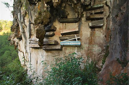 Hanging coffins of Animistic Applai elders entombed on limestone cliffs, Sagada Town, The Cordillera Mountains, Benguet Province, Luzon, Philippines, Southeast Asia, Asia Stock Photo - Rights-Managed, Code: 841-03055225