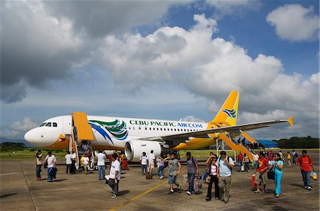 palawan - Aeroplane of Cebu Pacific, a low cost airline, Puerto Princesa Airport, Palawan, Philippines, Southeast Asia, Asia Foto de stock - Con derechos protegidos, Código: 841-03055241