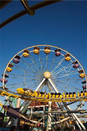 fair wheel - A rollercoaster at the Santa Monica Pier, Santa Monica, Los Angeles, California, United States of America, North America Stock Photo - Rights-Managed, Code: 841-03055327