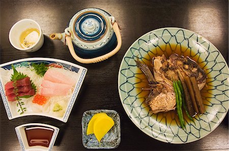 sushi plate - A traditional Japanese meal of sushi and fish head, Tokyo, Honshu Island, Japan, Asia Stock Photo - Rights-Managed, Code: 841-03055477