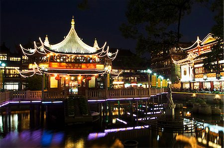 Yuyuan (Yu yuan) Garden Bazaar buildings founded by Ming dynasty Pan family illuminated in the Old Chinese city district, Shanghai, China, Asia Stock Photo - Rights-Managed, Code: 841-03055737