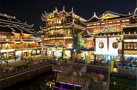 Yuyuan (Yu yuan) Garden Bazaar buildings founded by Ming dynasty Pan family illuminated in the Old Chinese city district, Shanghai, China, Asia Stock Photo - Rights-Managed, Code: 841-03055738