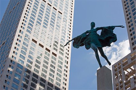 simsearch:841-03055646,k - Statue of a woman among high office buildings in Guomao CBD, Beijing, China, Asia Stock Photo - Rights-Managed, Code: 841-03056144