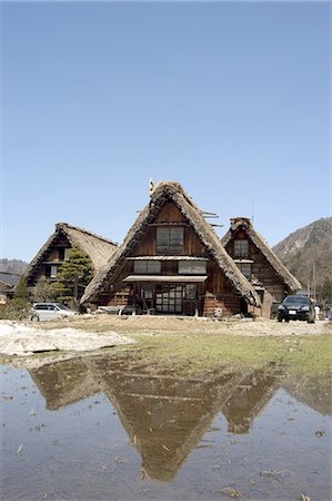 shirakawago - Snow melt, reflection of gasshou zukuri thatched roof houses, Shirokawago, Ogimachi, Gifu prefecture, Honshu island, Japan, Asia Stock Photo - Rights-Managed, Code: 841-03056179