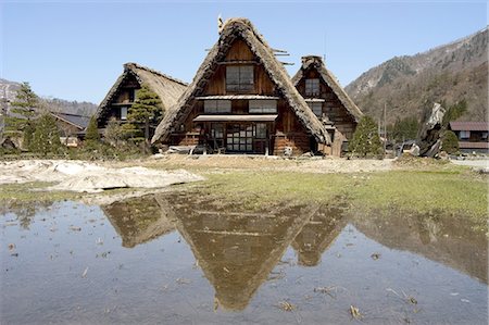 shirakawago - Reflection of gasshou zukuri thatched roof houses, Shirokawago, Ogimachi, Gifu prefecture, Honshu island, Japan, Asia Stock Photo - Rights-Managed, Code: 841-03056180