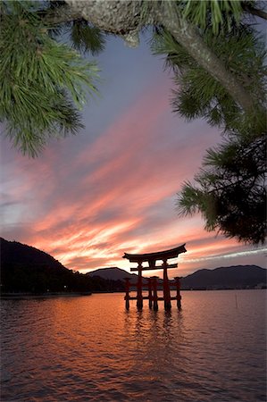 Torii Shrine Gate in the sea, UNESCO World Heritage, Miyajima Island, Hiroshima prefecture, Honshu, Japan, Asia Stock Photo - Rights-Managed, Code: 841-03056204
