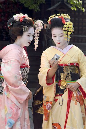 Geisha, maiko (trainee geisha) in Gion, Kyoto city, Honshu, Japan, Asia Stock Photo - Rights-Managed, Code: 841-03056245