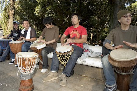 Drumming group, Harajuku, Yoyogi koen park, Tokyo, Honshu, Japan, Asia Stock Photo - Rights-Managed, Code: 841-03056326