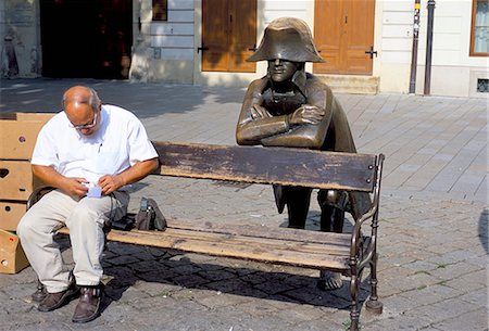 slovakia people - Man on park bench and statue of Napoleon, Hlavne Square, Bratislava, Slovakia, Europe Stock Photo - Rights-Managed, Code: 841-03056842