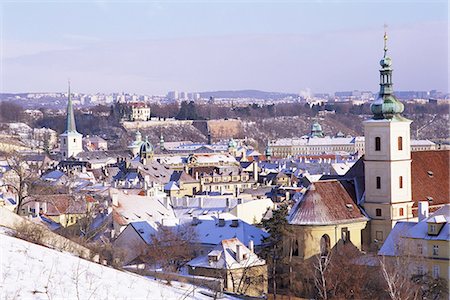 simsearch:841-02707067,k - Snow covered Baroque church of Our Lady Victorious, dating from 1644, and rooftops of Mala Strana suburb, Hradcany, Prague, Czech Republic, Europe Stock Photo - Rights-Managed, Code: 841-03056921