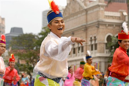 simsearch:841-03056948,k - Robe de danseuse malais porte traditionnelle lors des célébrations de Kuala Lumpur ville commémoration de la journée, Merdeka Square, Kuala Lumpur, Malaisie, Asie du sud-est, Asie Photographie de stock - Rights-Managed, Code: 841-03056940
