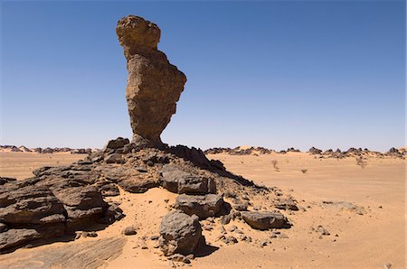 simsearch:841-03673351,k - Rock formation called The Finger of Allah, Akakus, Sahara desert, Fezzan, Libya, North Africa, Africa Foto de stock - Con derechos protegidos, Código: 841-03058515