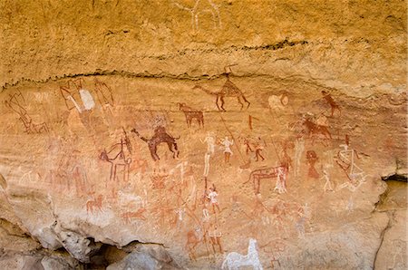 Prehistoric rock paintings, Akakus, Sahara desert, Fezzan, Libya, North Africa, Africa Foto de stock - Con derechos protegidos, Código: 841-03058518