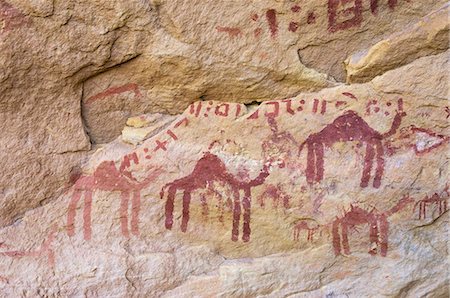 prehistoric pictographs - Prehistoric rock paintings, Wadi Teshuinat, Akakus, Sahara desert, Fezzan, Libya, North Africa, Africa Stock Photo - Rights-Managed, Code: 841-03058538