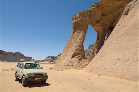 Tin Ghalega rock formation, Red Rhino Arch, Wadi Teshuinat, Akakus, Sahara desert, Fezzan (Libye), l'Afrique du Nord, Afrique Photographie de stock - Rights-Managed, Code: 841-03058532