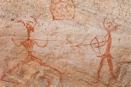 Prehistoric rock paintings, Akakus, Sahara desert, Fezzan, Libya, North Africa, Africa Stock Photo - Rights-Managed, Code: 841-03058549