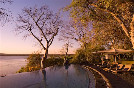 The River Club lodge, sunset on Zambesi River, Zambia, Africa Stock Photo - Rights-Managed, Code: 841-03058820