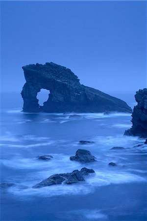 foula shetland - Gaada Stack, a natural arch 45 m high, old red sandstone, Foula, Shetland Islands, Scotland, United Kingdom, Europe Stock Photo - Rights-Managed, Code: 841-03064235