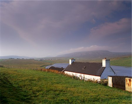 House at Flugarth by loch of Flugarth, and North Roe in the distance, near North Roe, Northmavine, Shetland Islands, Scotland, United Kingdom, Europe Stock Photo - Rights-Managed, Code: 841-03064290