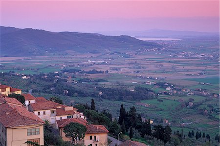 View from the medieval town of Cortona towards Lago Trasimeno, at sunset, Cortona, Tuscany, Italy, Europe Stock Photo - Rights-Managed, Code: 841-03064400