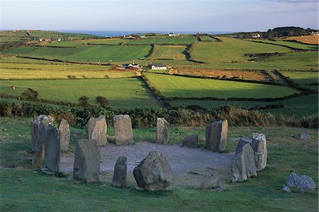 standing stones of ireland - Drombeg Stone Circle, circa 200 B.C., comprising 17 stones, and nearby cooking and hut site, near Glandore, County Cork, Munster, Republic of Ireland, Europe Stock Photo - Rights-Managed, Code: 841-03064450